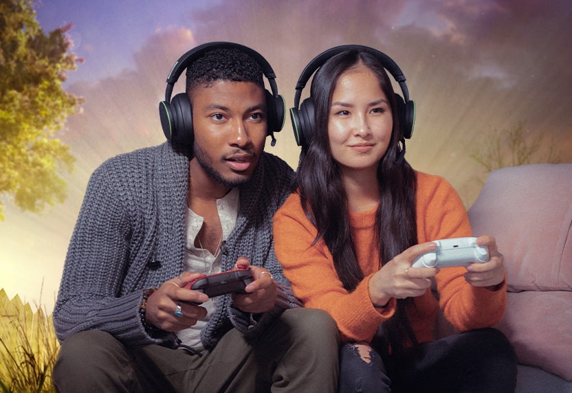 Two people playing Xbox. 