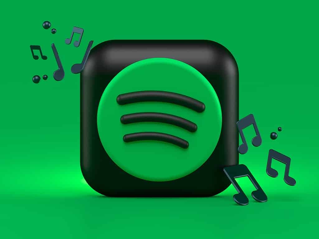 Spotify logo in front of green background.