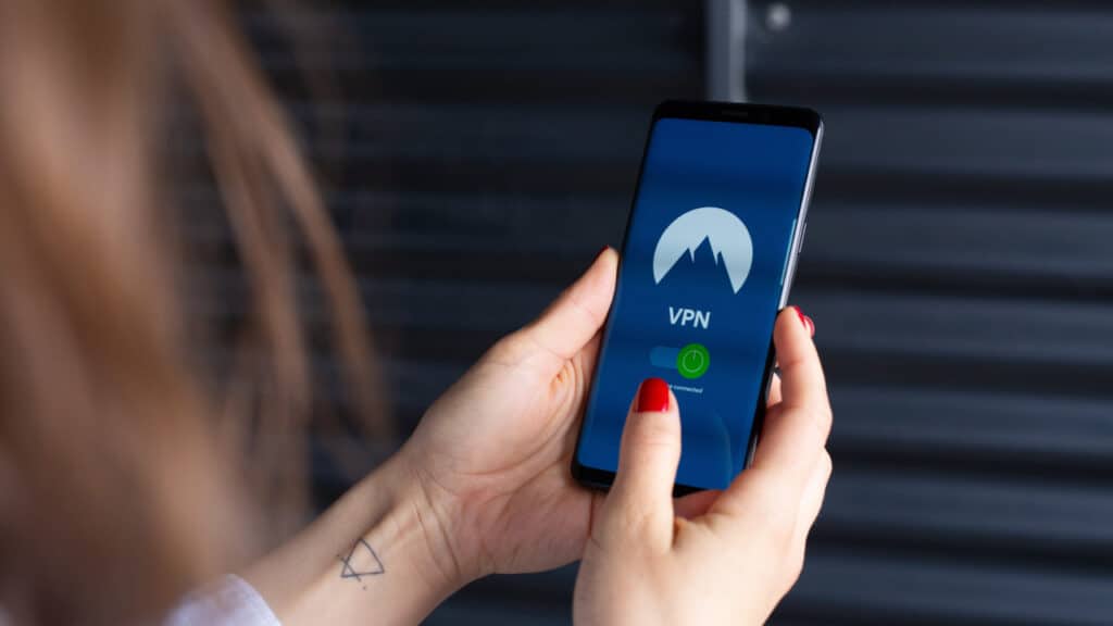 Person using NordVPN on their phone.
