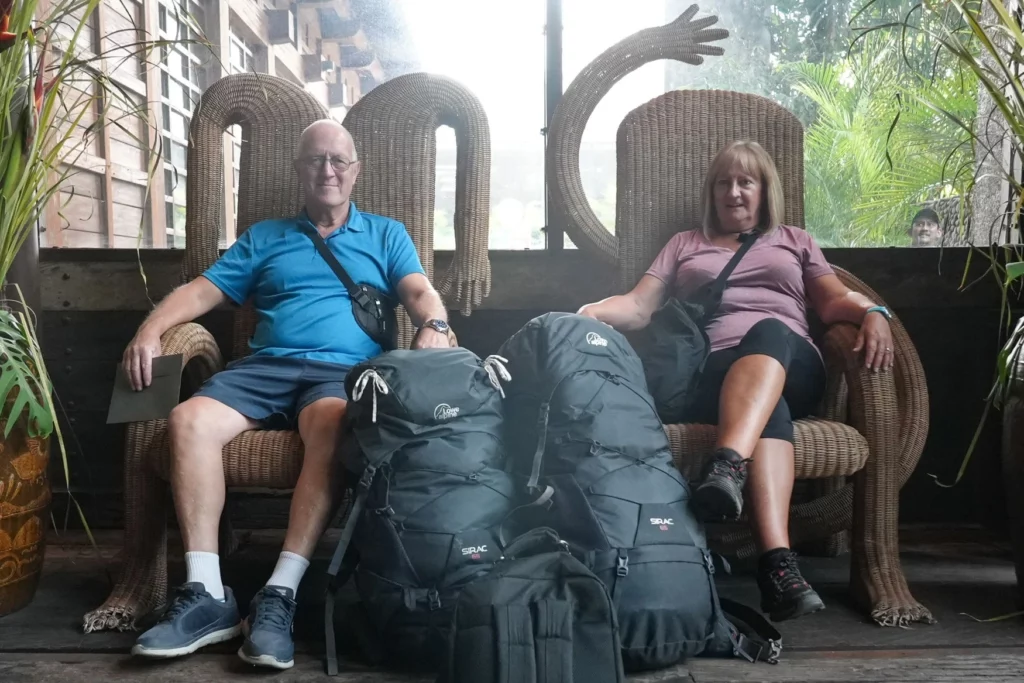 Stephen and Viv having a rest with their massive backpacks